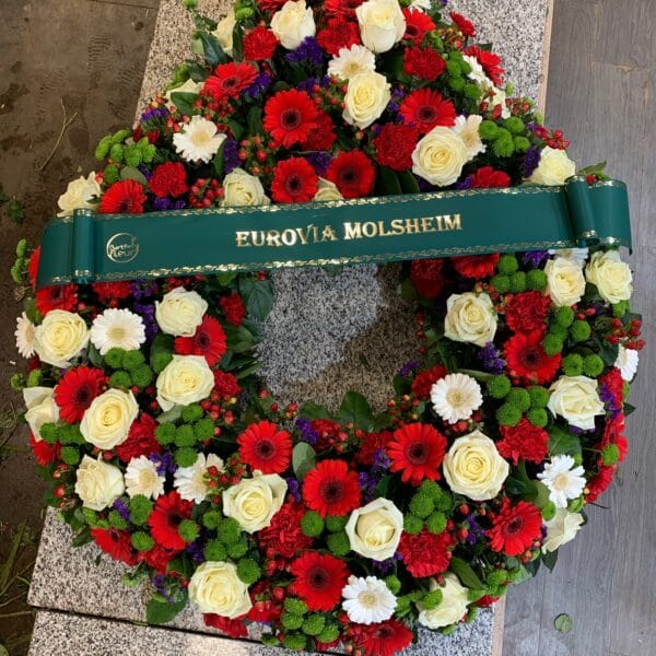 Couronne rouge et blanche, touche de mauve