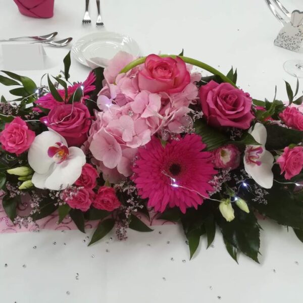 Arrangement de tableau rose fuchsia
